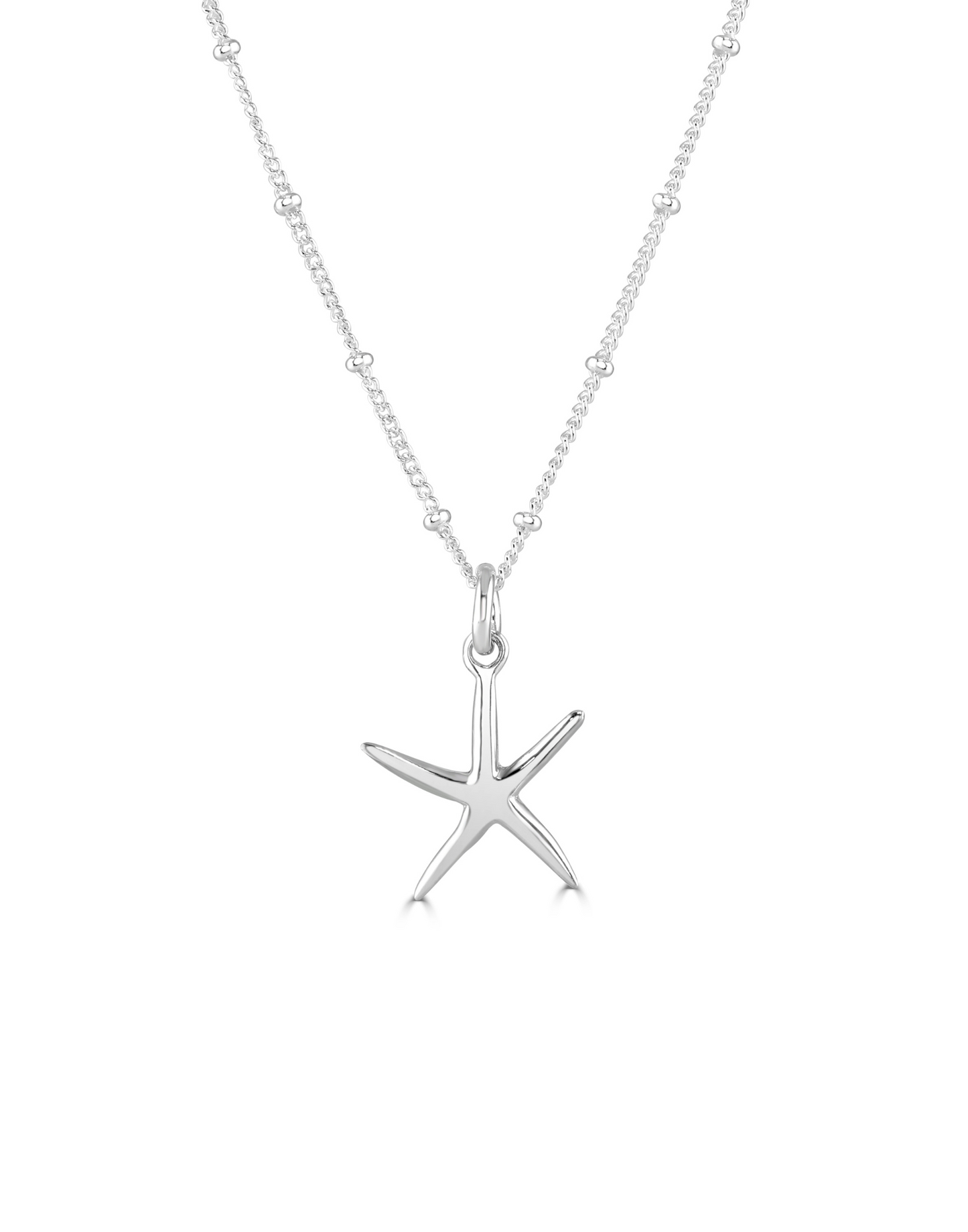 silver starfish necklace on white background