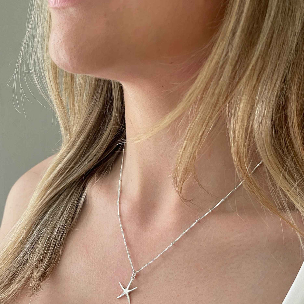 Silver Starfish Pendant on model