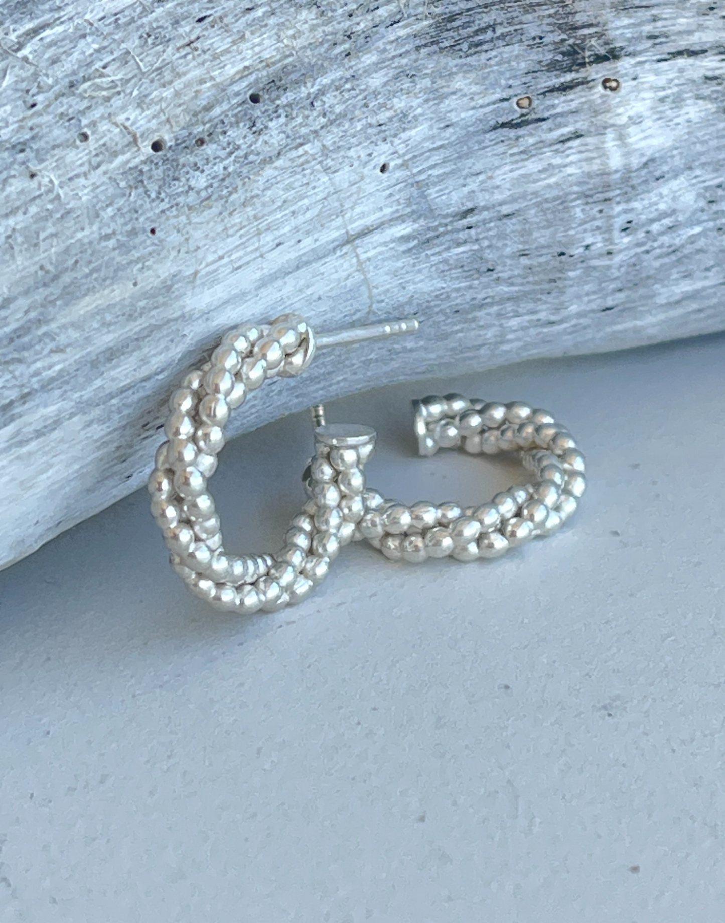 Silver twisted bead hoop earrings