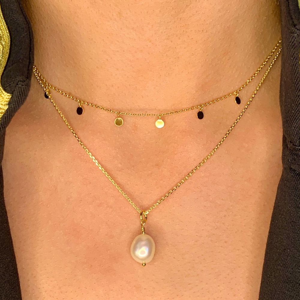 model wearing Tilly Gold Disc necklace