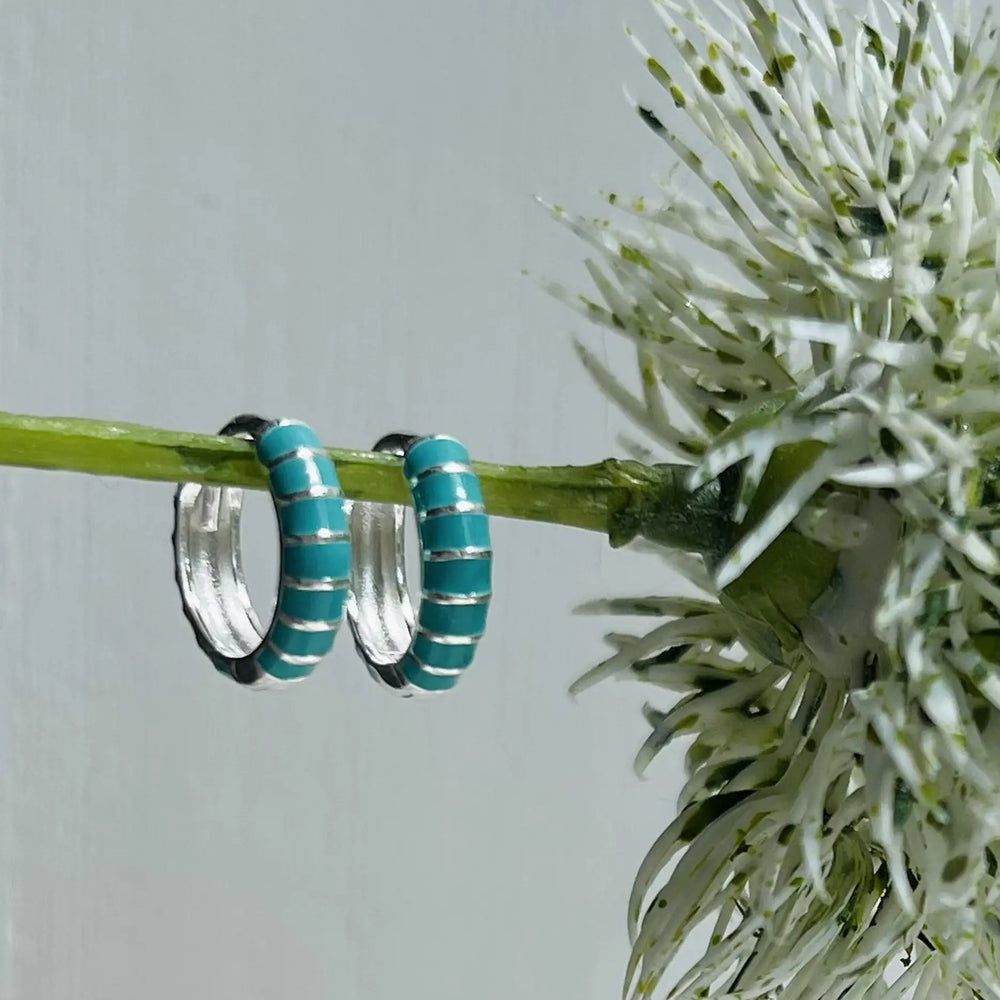 Turquoise Enamel Huggies on flower