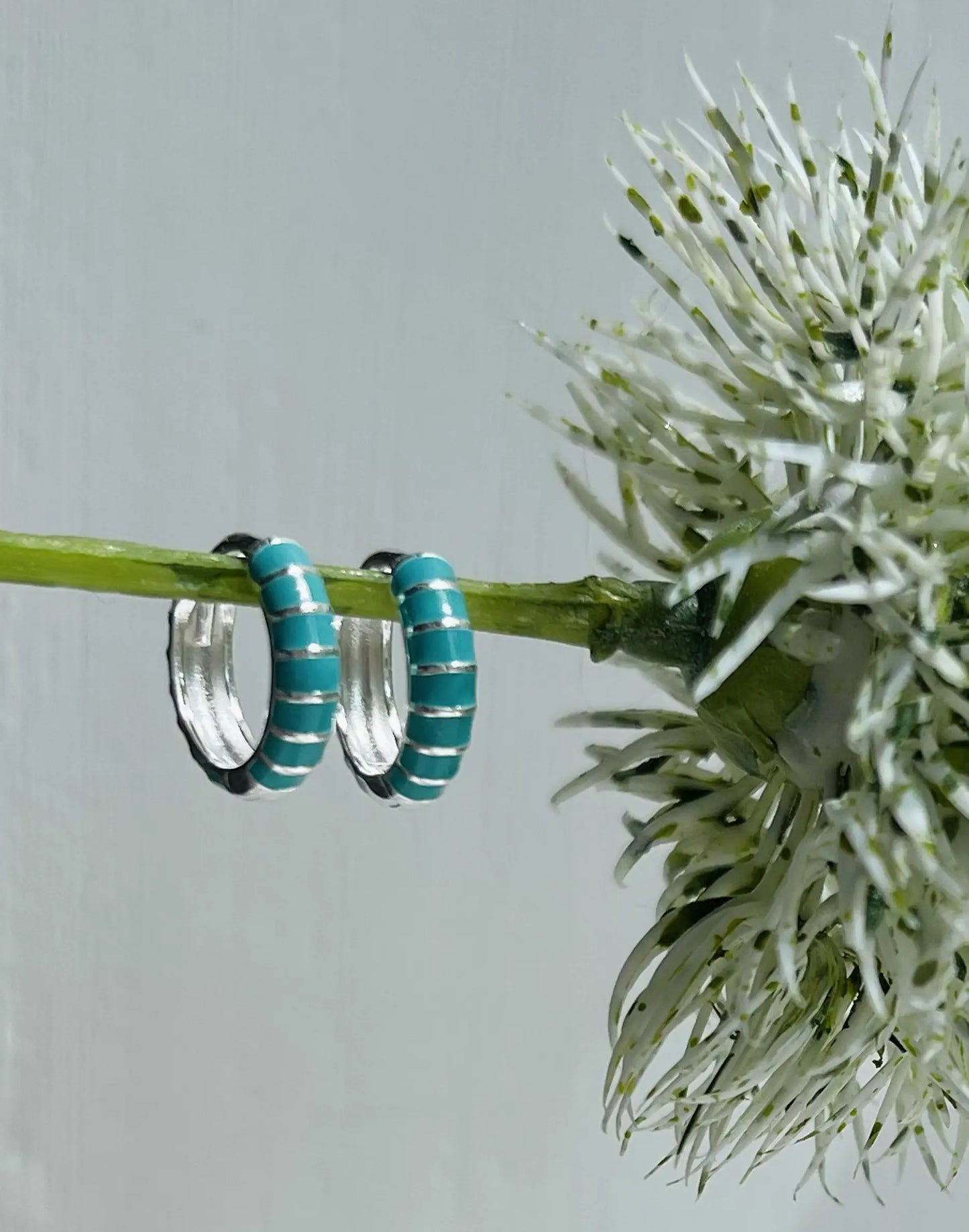 Turquoise Enamel Huggies on flower