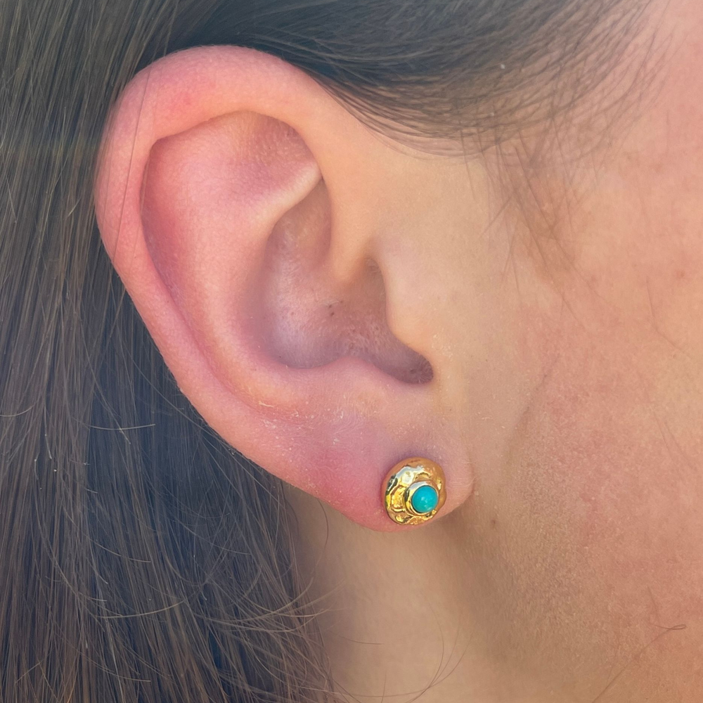 
                  
                    Turquoise_and_Gold_Stud_Earrings in ear
                  
                