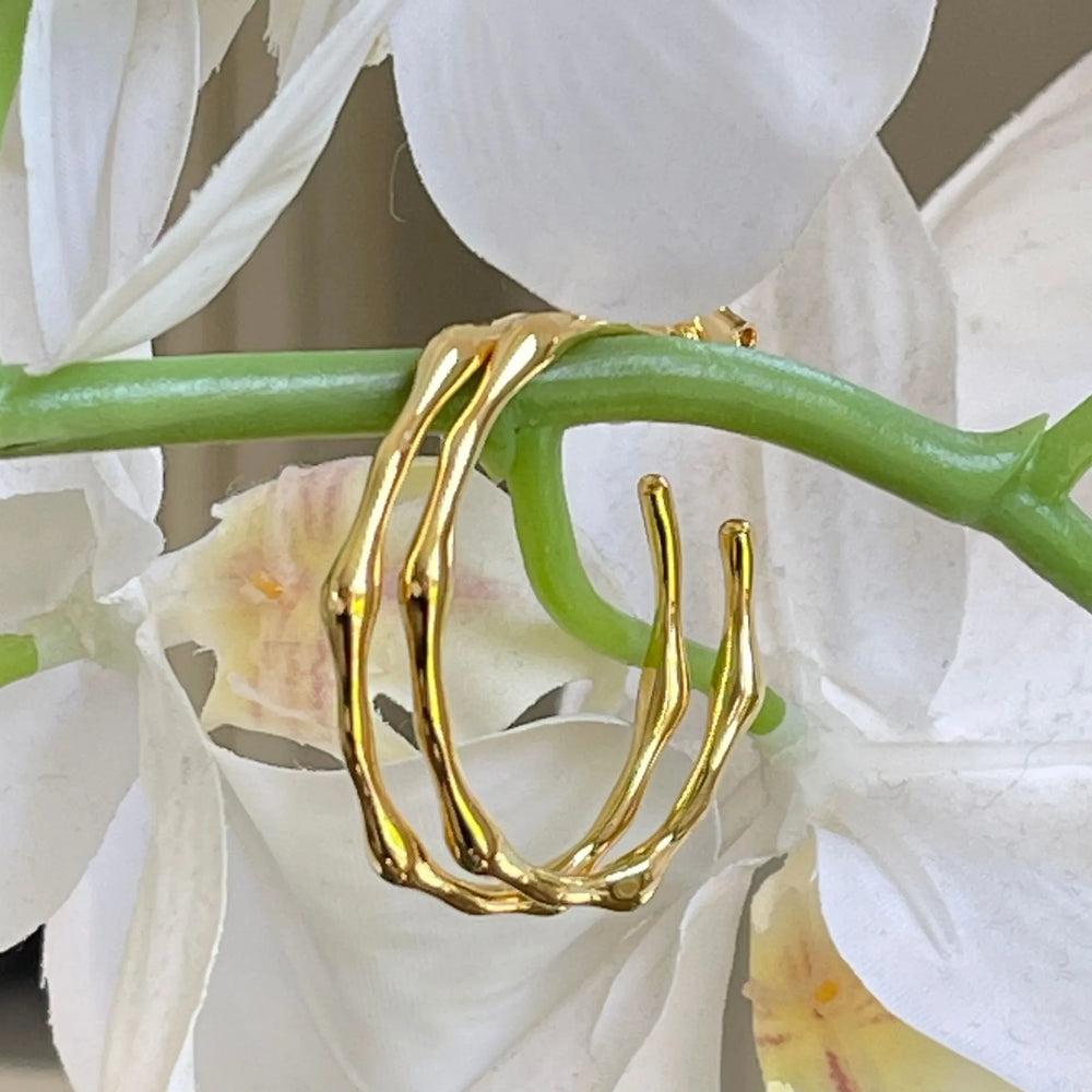 Zelda Gold Bamboo Hoop Earrings in flowers