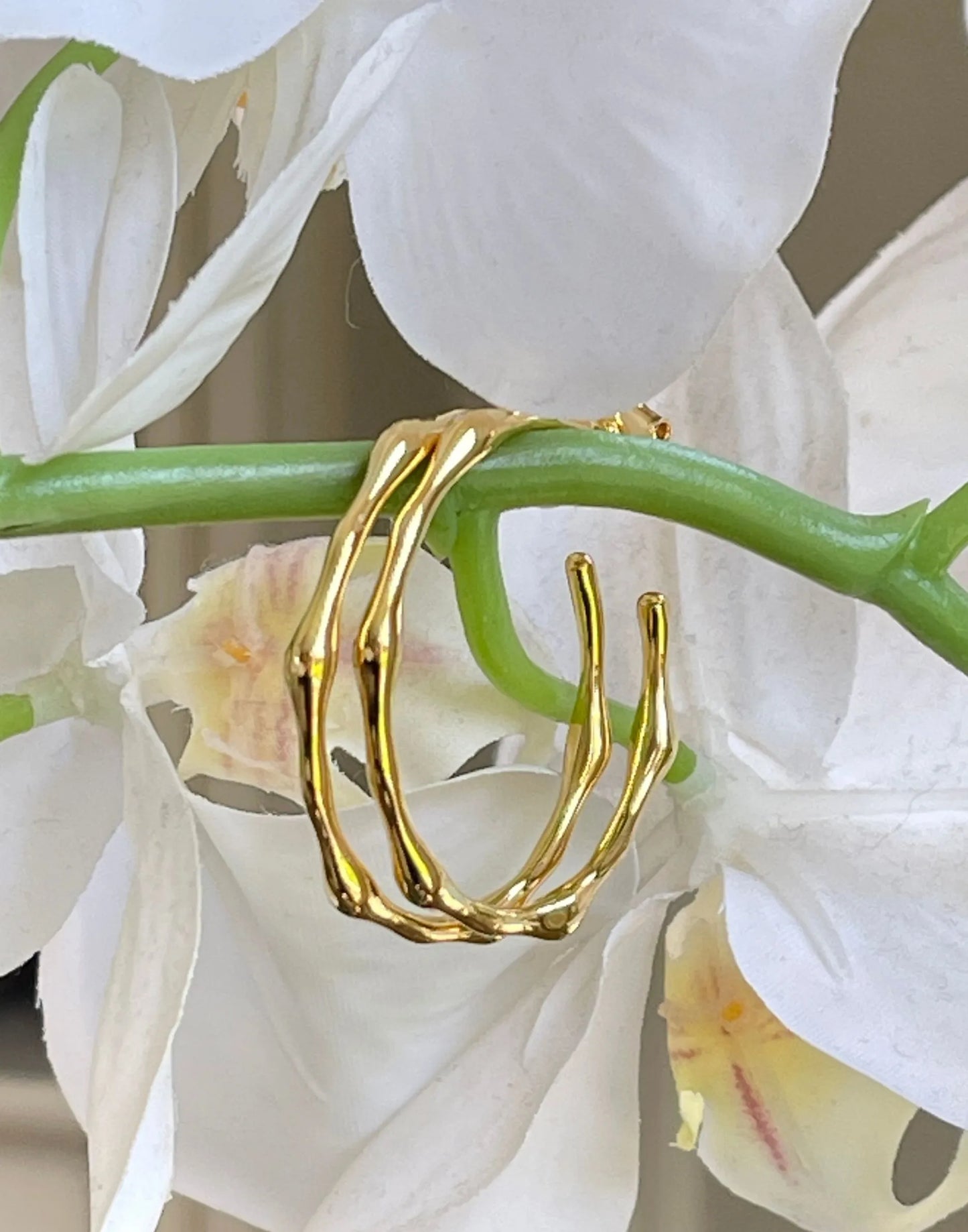 Zelda Gold Bamboo Hoop Earrings in flowers