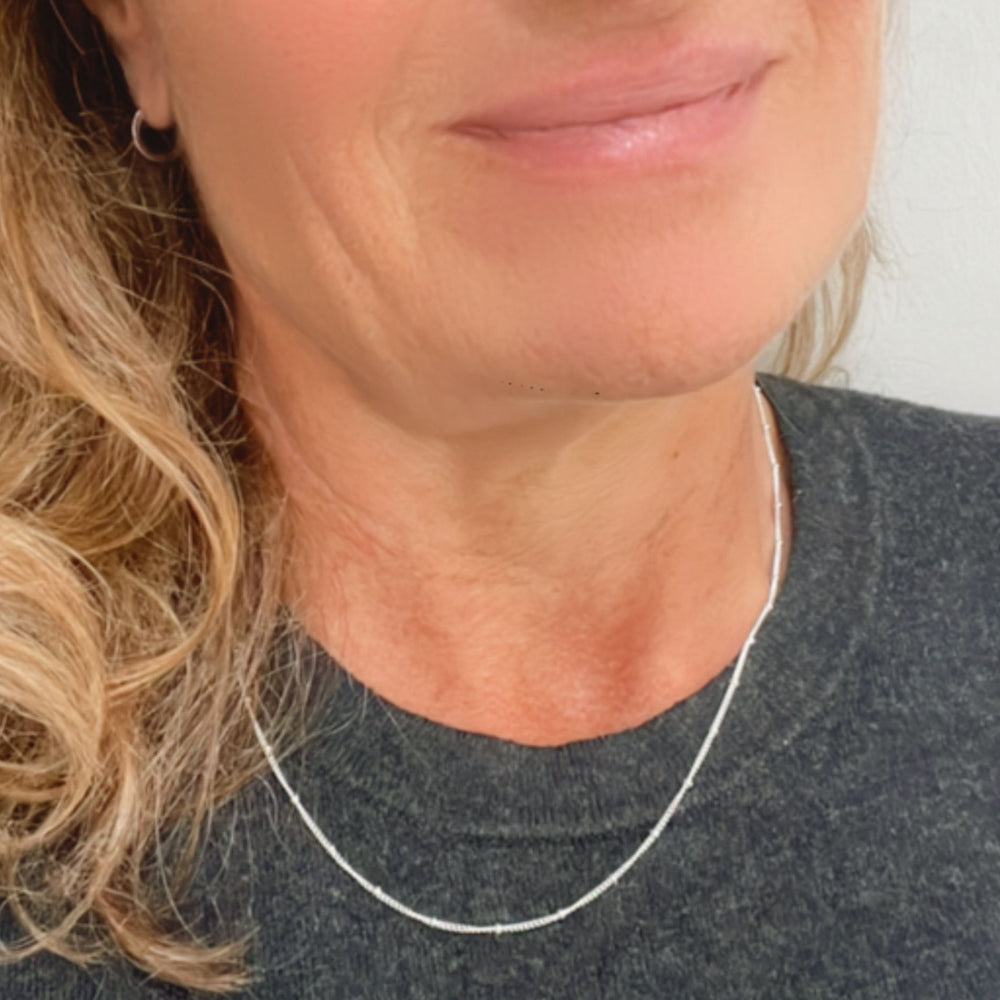satellite chain on neck