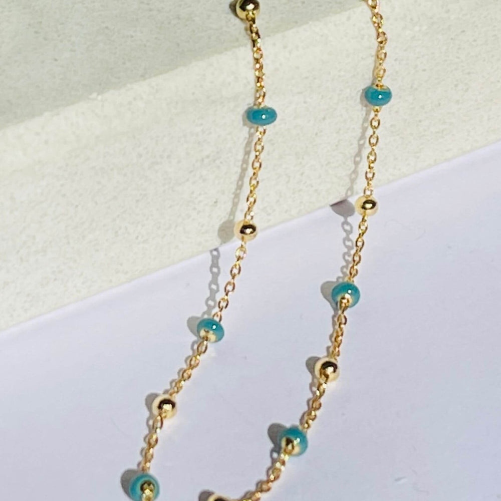 gold light turquoise enamel necklace
