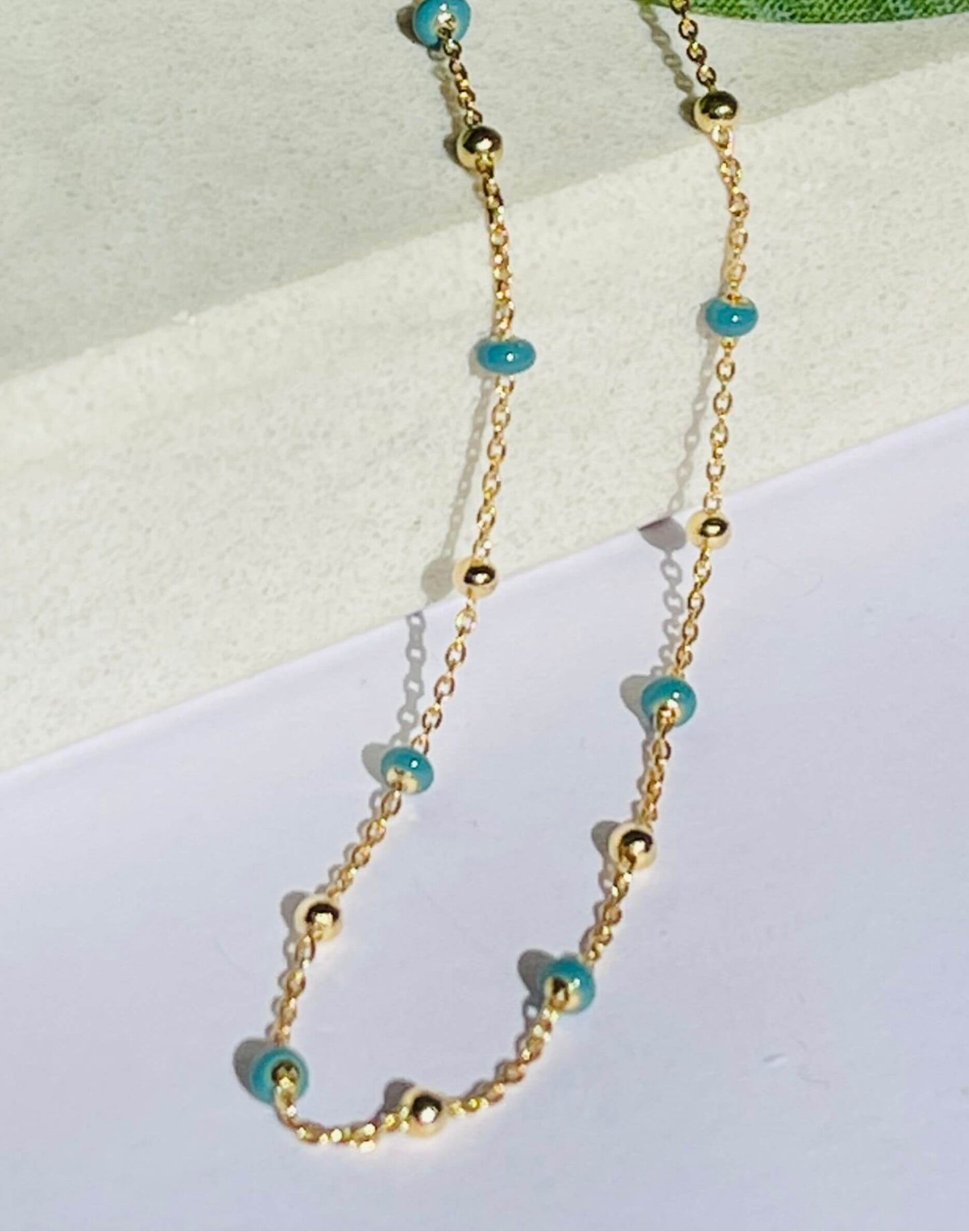 gold light turquoise enamel necklace