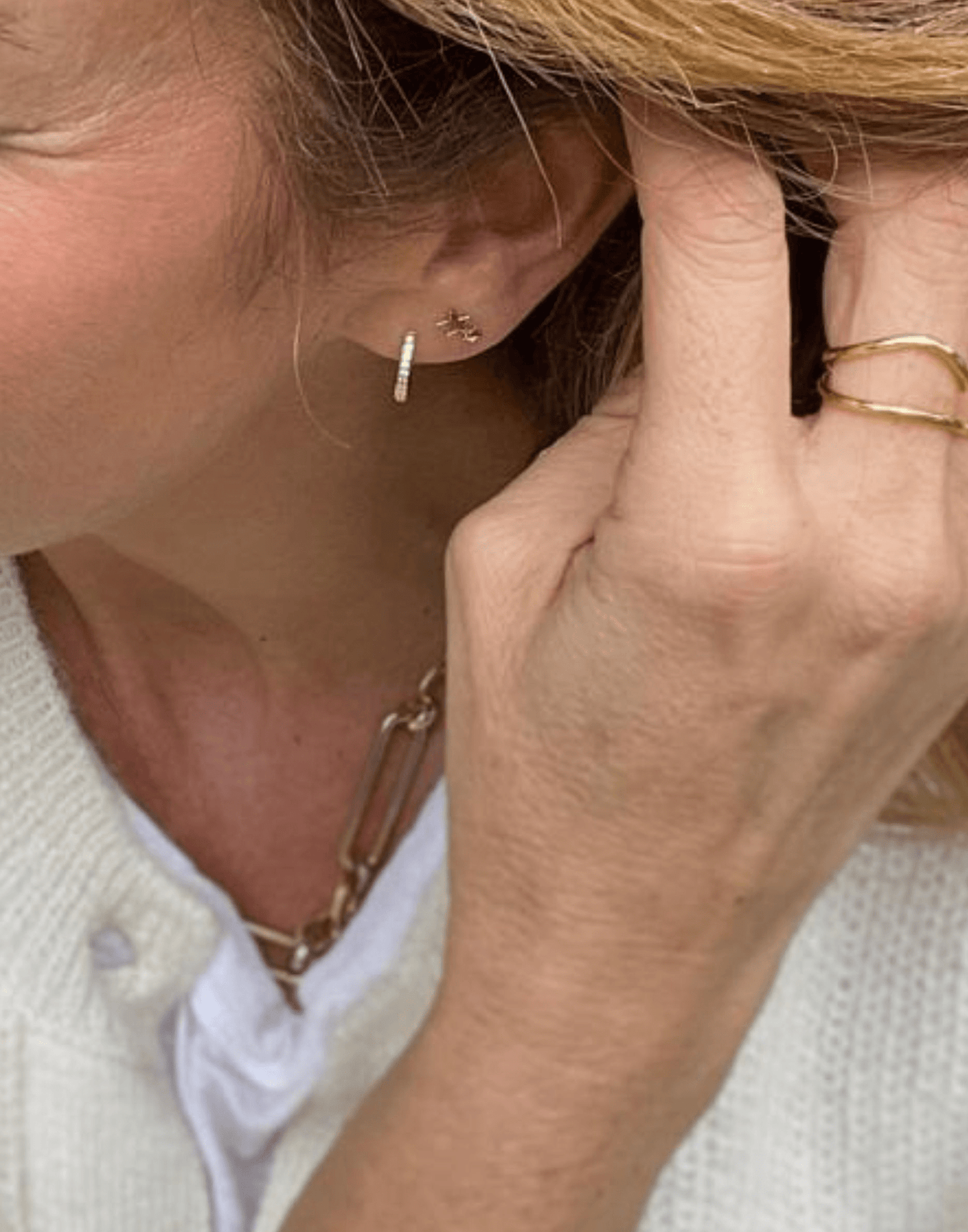 gold double star stud in ear with cz huggie