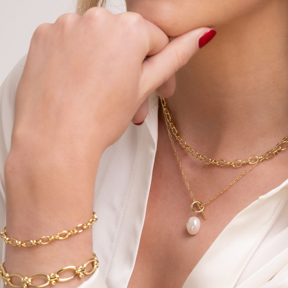 
                  
                    model wears jessica and pippa bracelet with necklace stack
                  
                