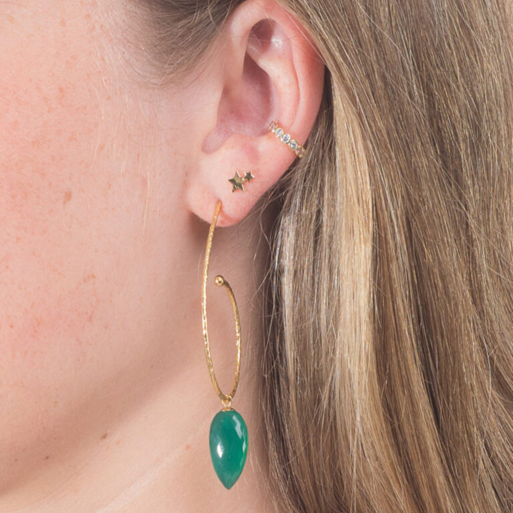 large gold hoop with gree onyx drop in ear