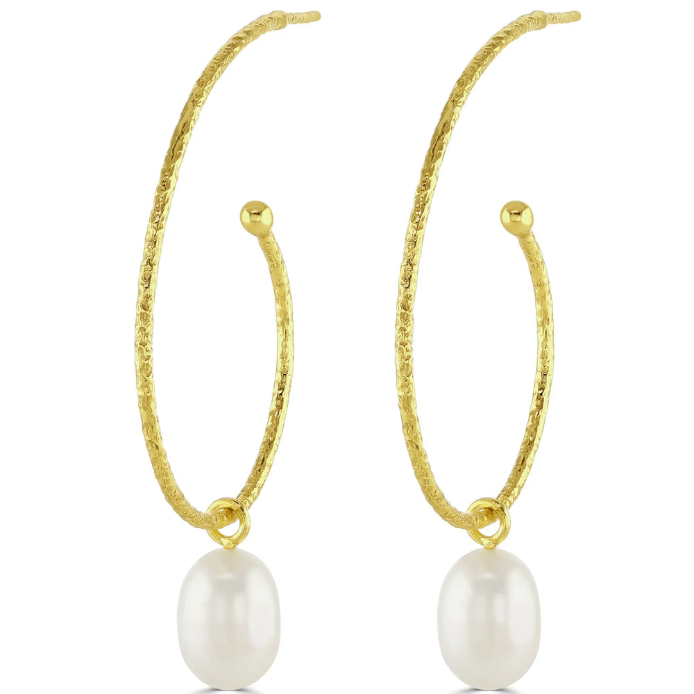 
                  
                    large pearl hoops with pearl drop on white background
                  
                
