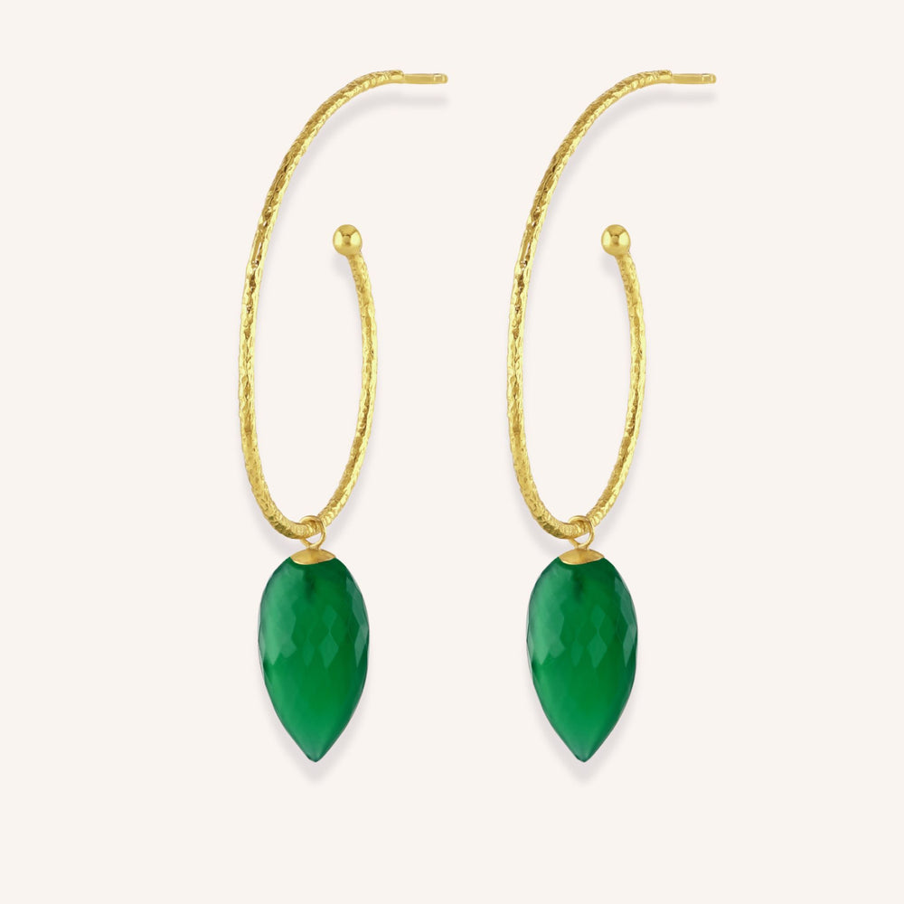 model wears large gold hoop with gree onyx drop cut out image