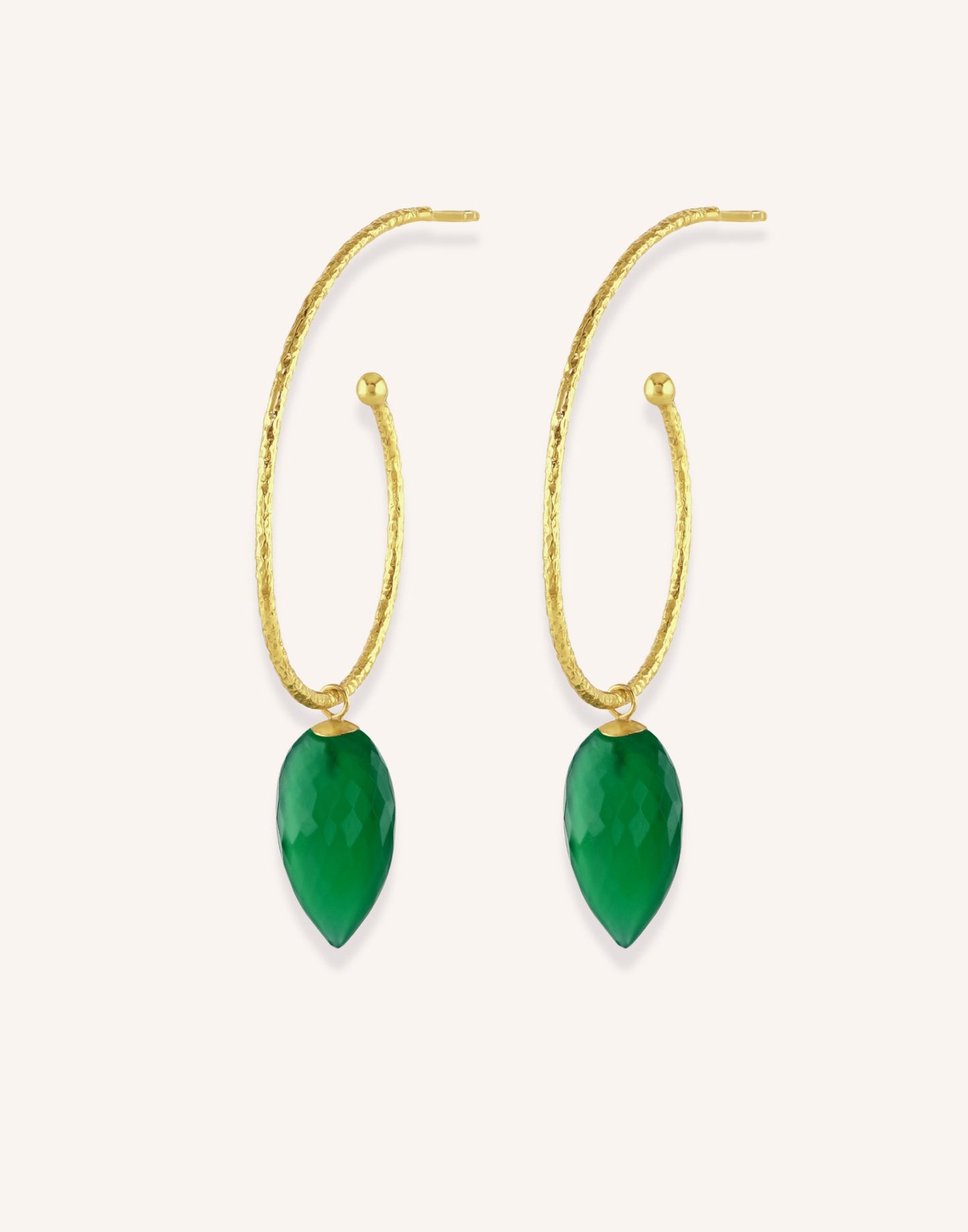 model wears large gold hoop with gree onyx drop cut out image