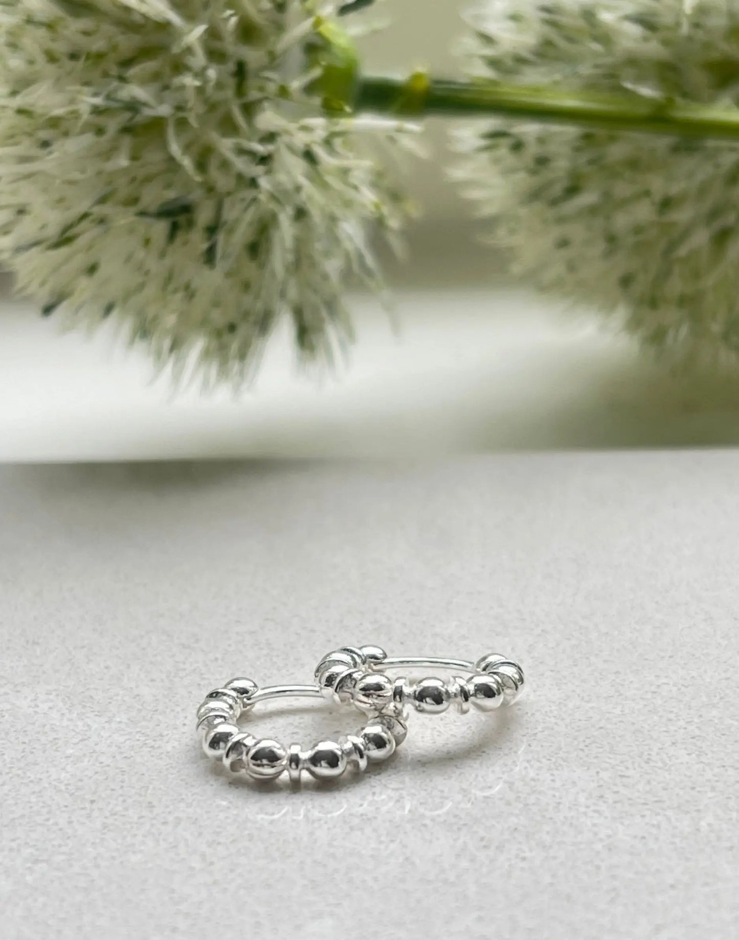 silver bobble huggies with flowers