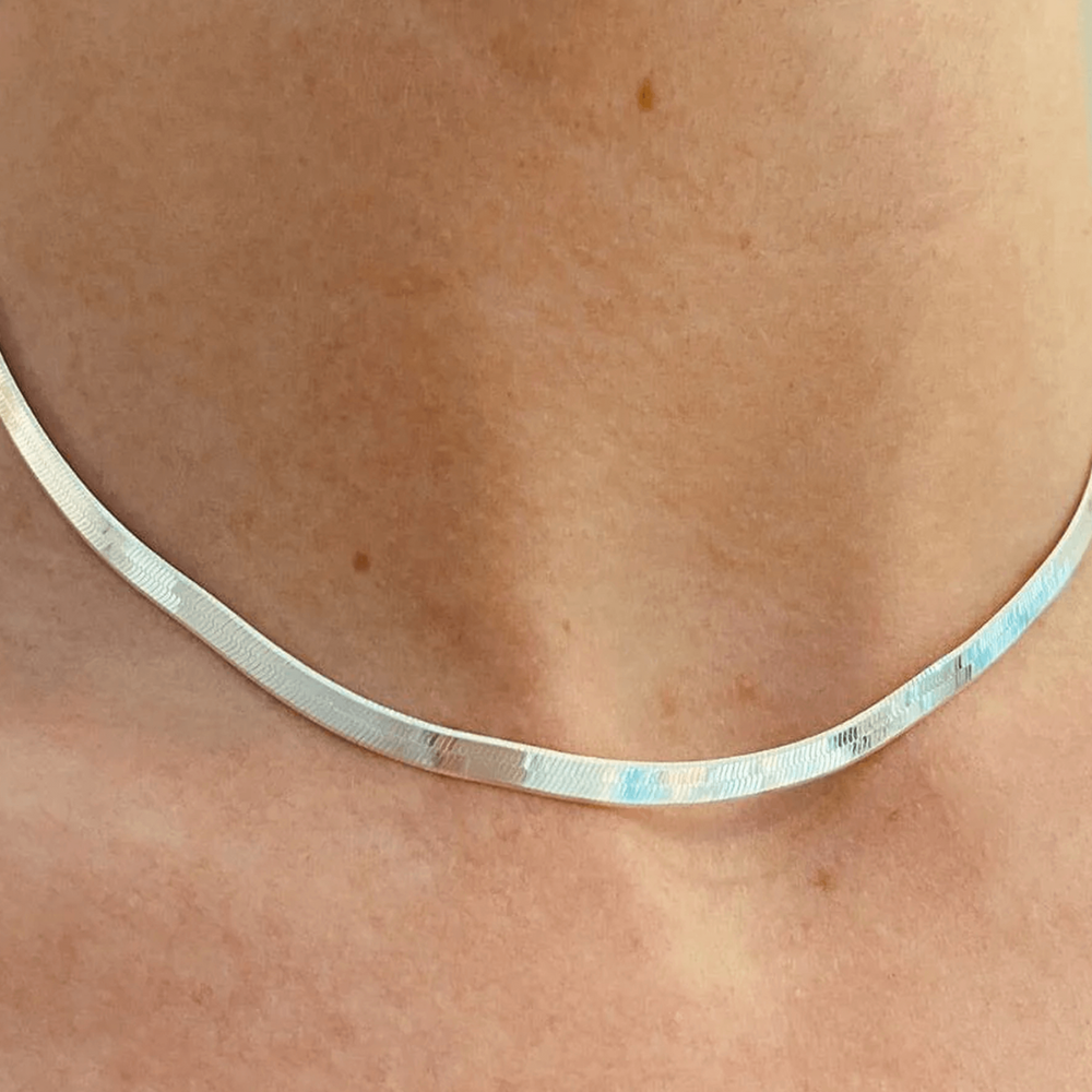 
                  
                    Silver herringbone necklace 41cm on model
                  
                