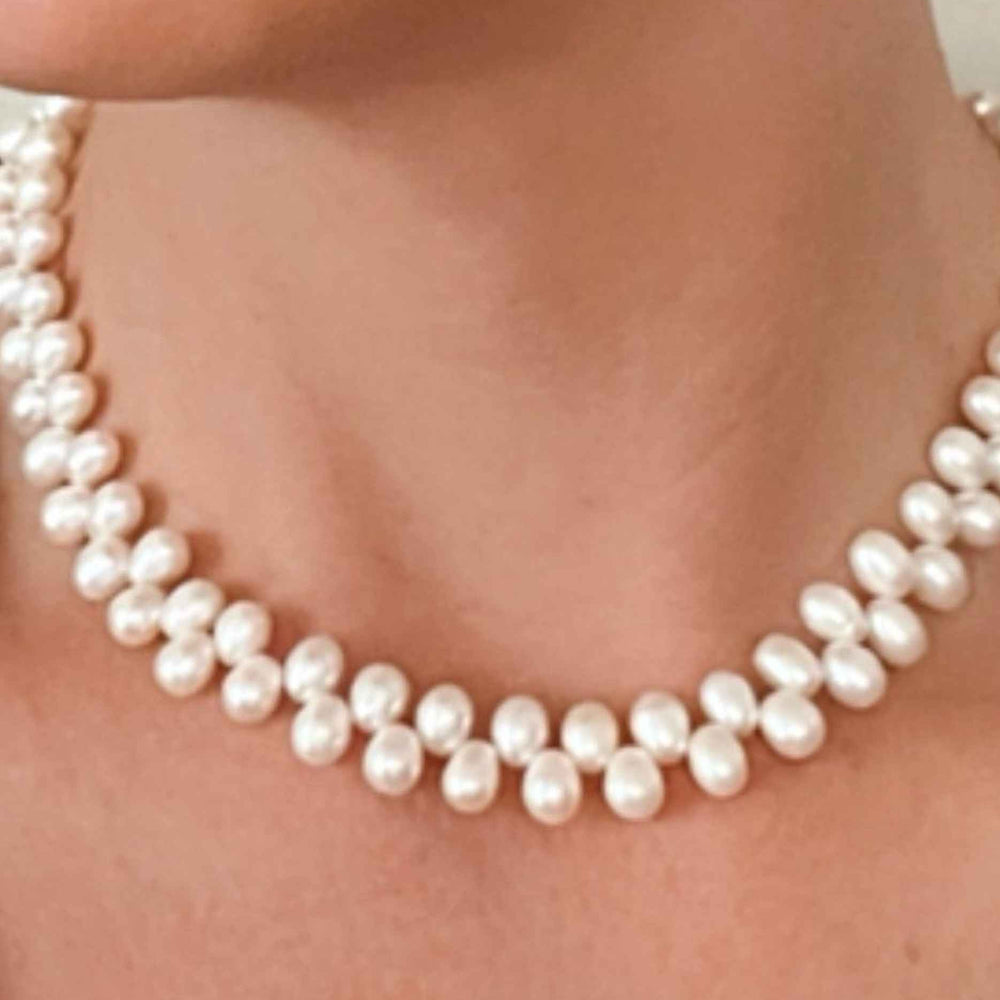 unusual pearl necklace on model