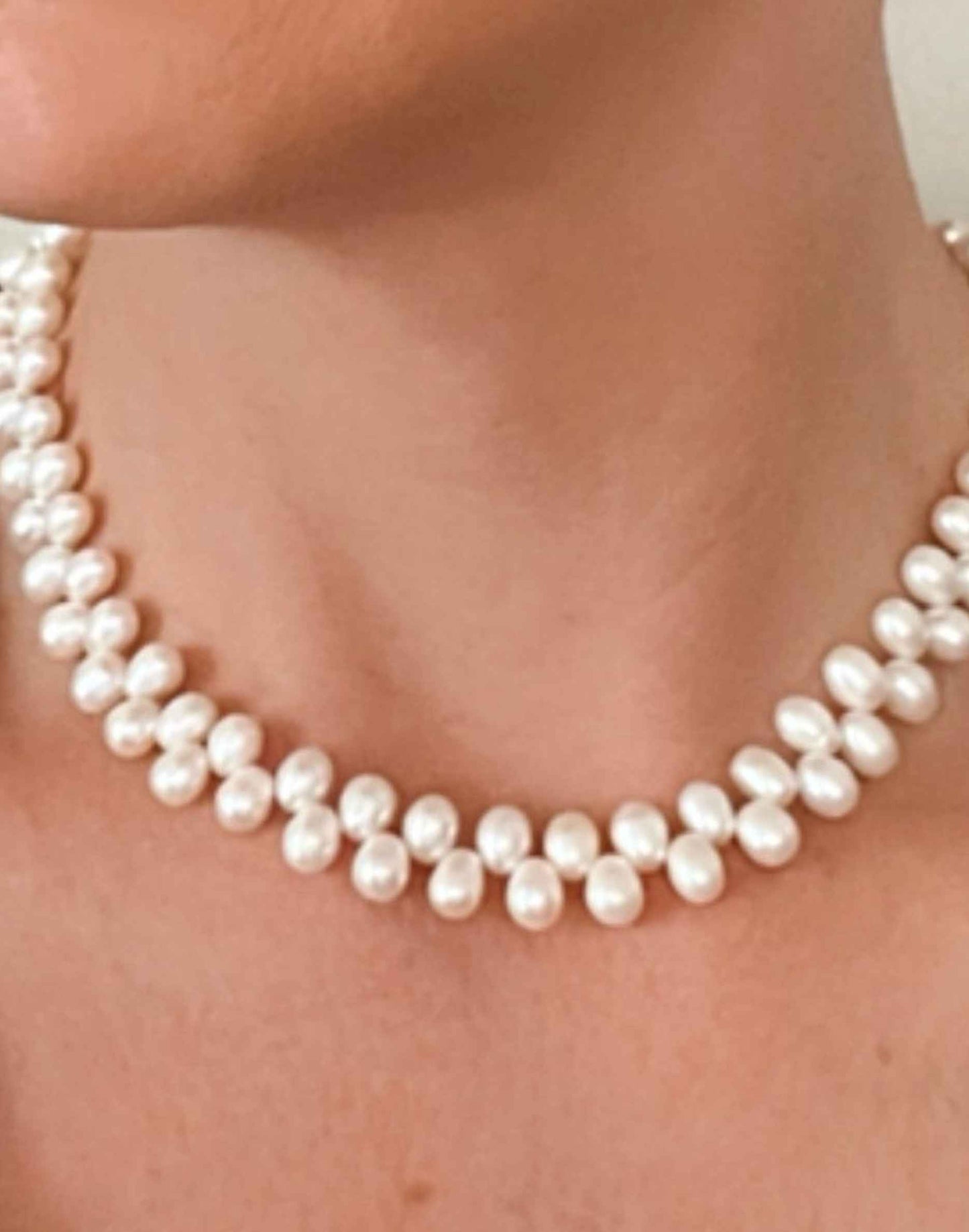 unusual pearl necklace on model