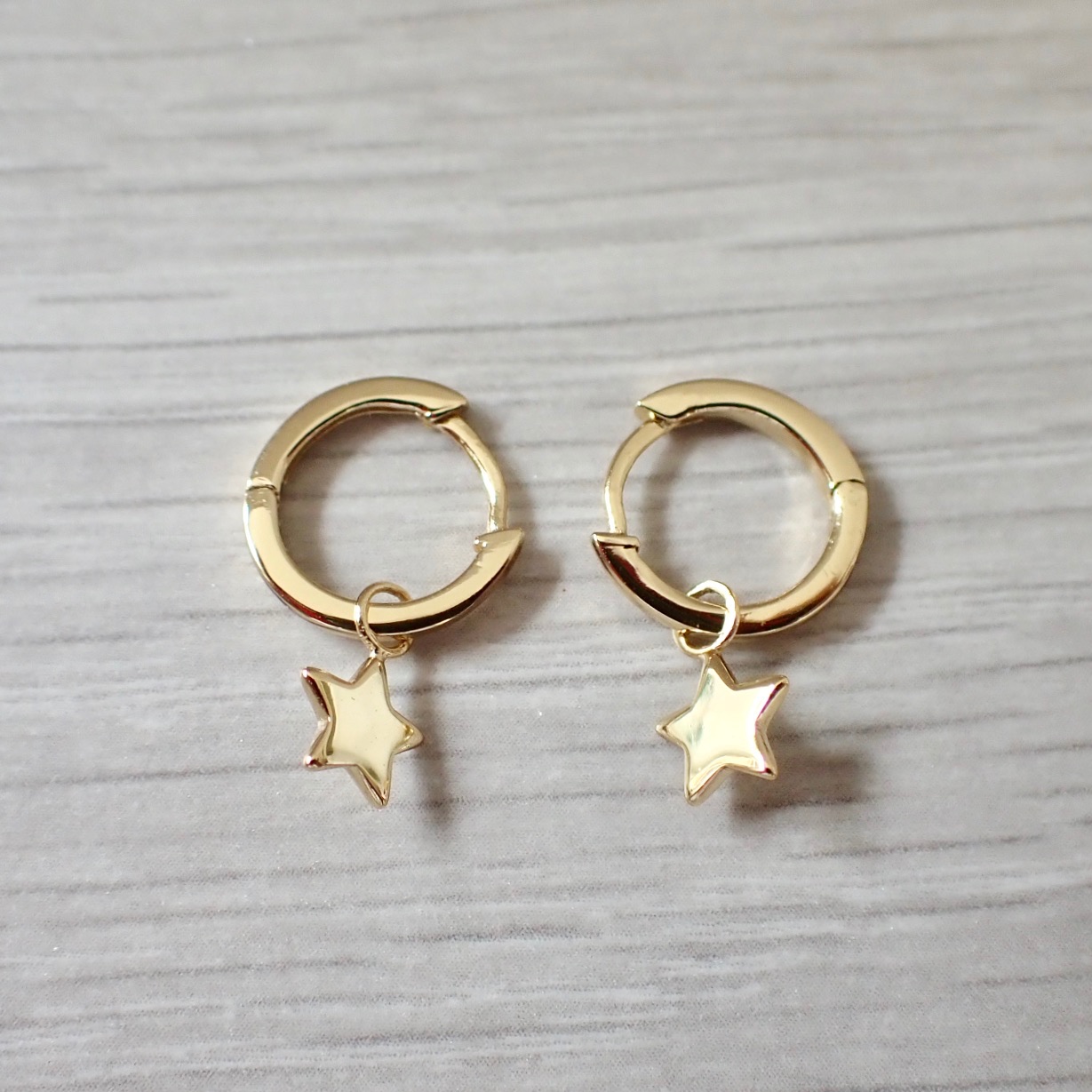 Hannah Gold Star Charm Huggie Earrings | Flutterby Jewellery