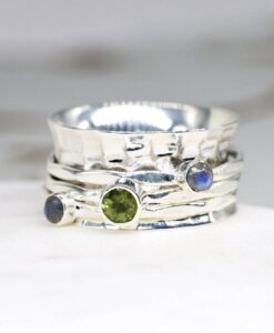 Silver spinning ring with Peridot