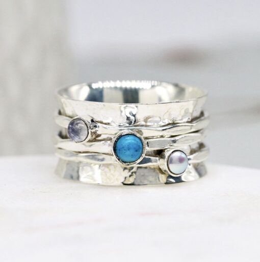 Silver spinning ring with turquoise