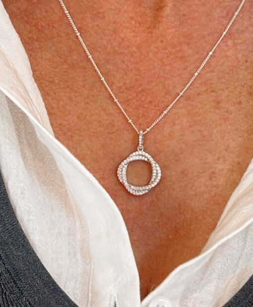 model wears Cubic Zirconia Twisted Circle Necklace